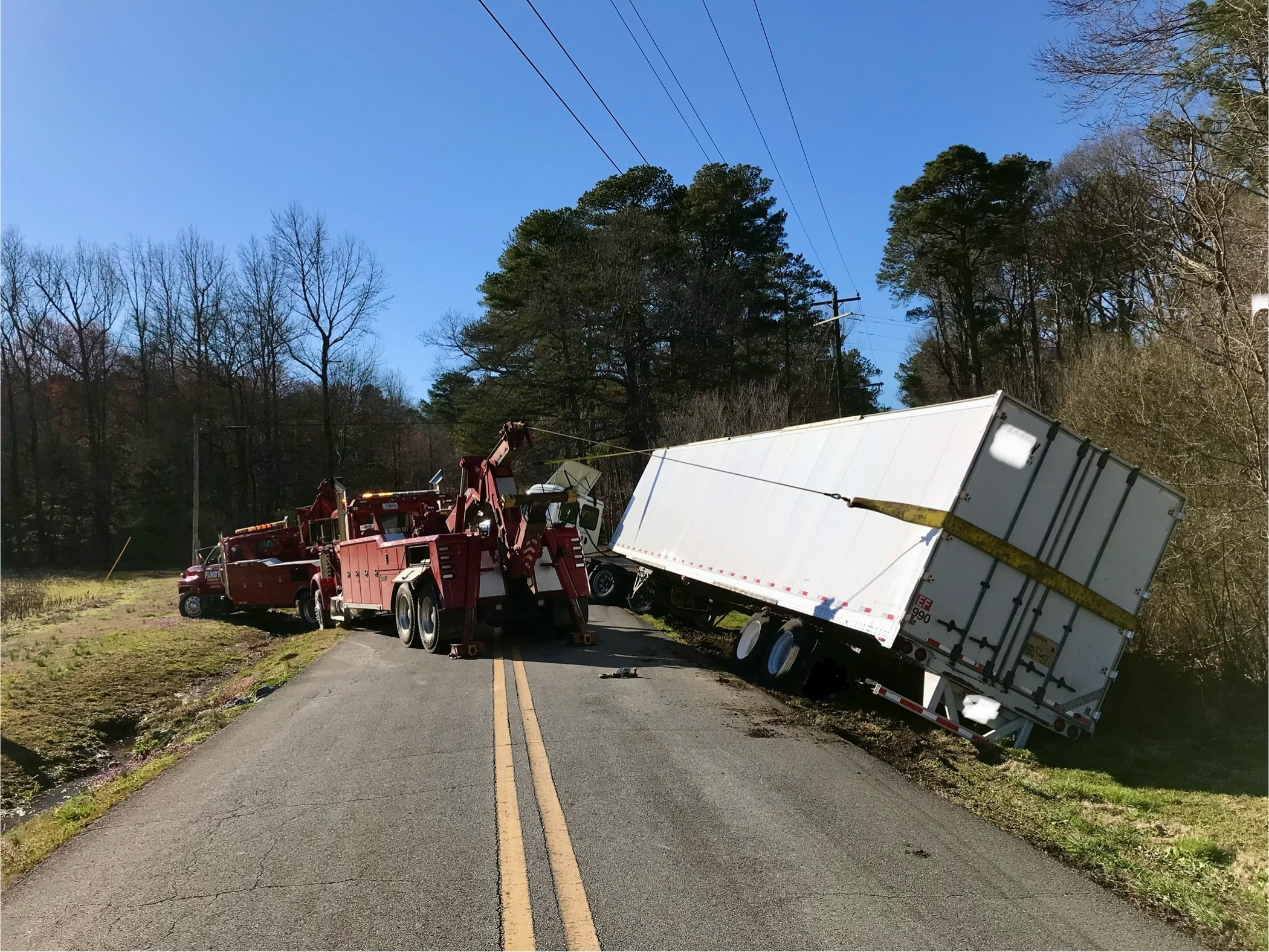 Flood's Towing Light & Heavy-Duty Towing, Light & Heavy-Duty Recovery, and equipment hauling